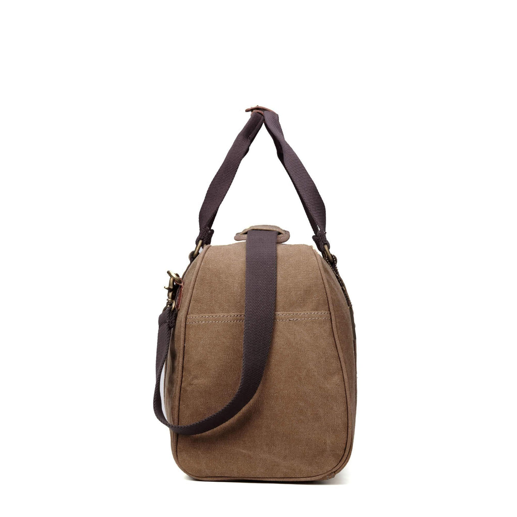 Medium stonewashed canvas travel duffel bag with genuine leather trim and brass hardware carry handles. — view 5
