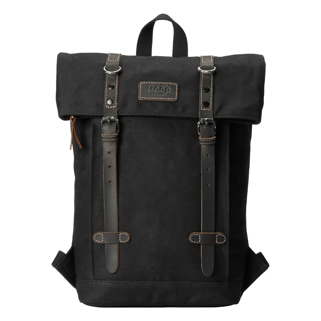 Small waxed canvas backpack in vintage style featuring fold-top closure and genuine leather trim detailing — view 2