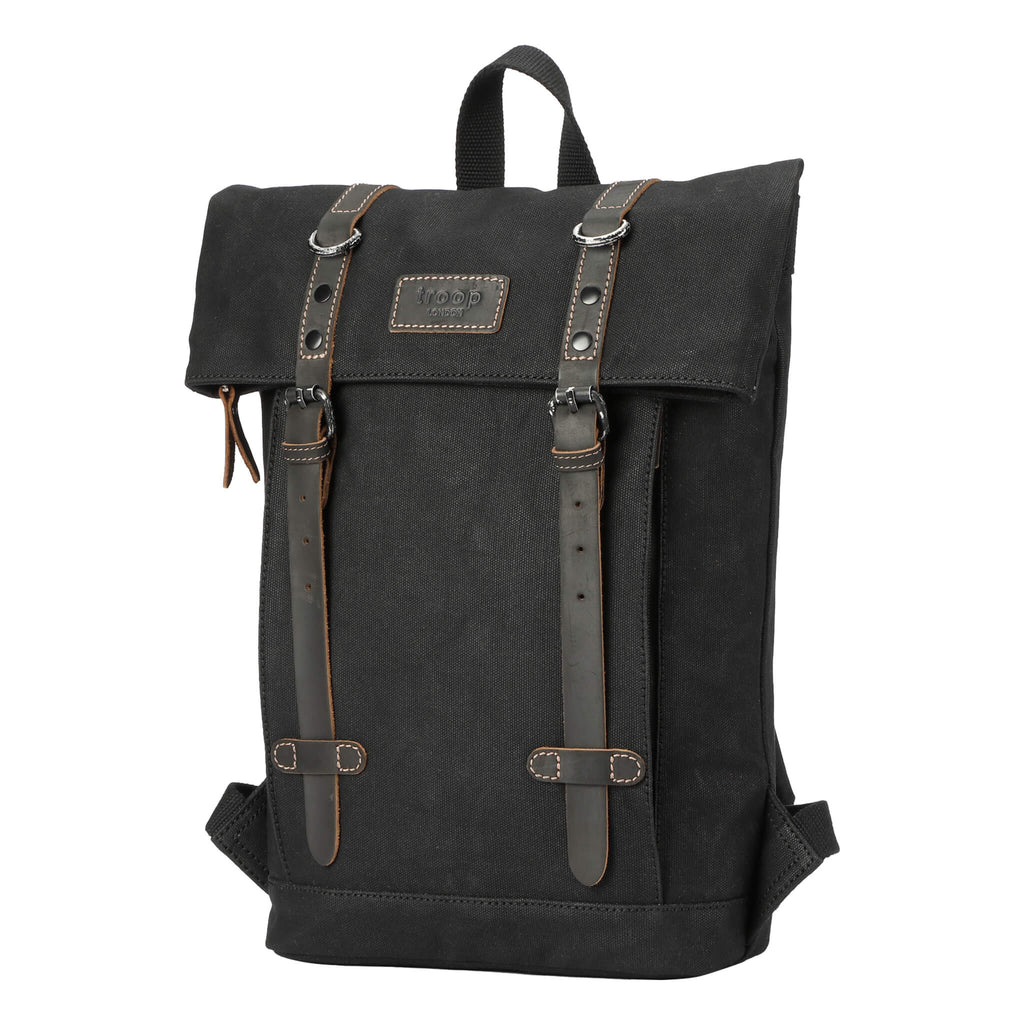 Small waxed canvas backpack in vintage style featuring fold-top closure and genuine leather trim detailing