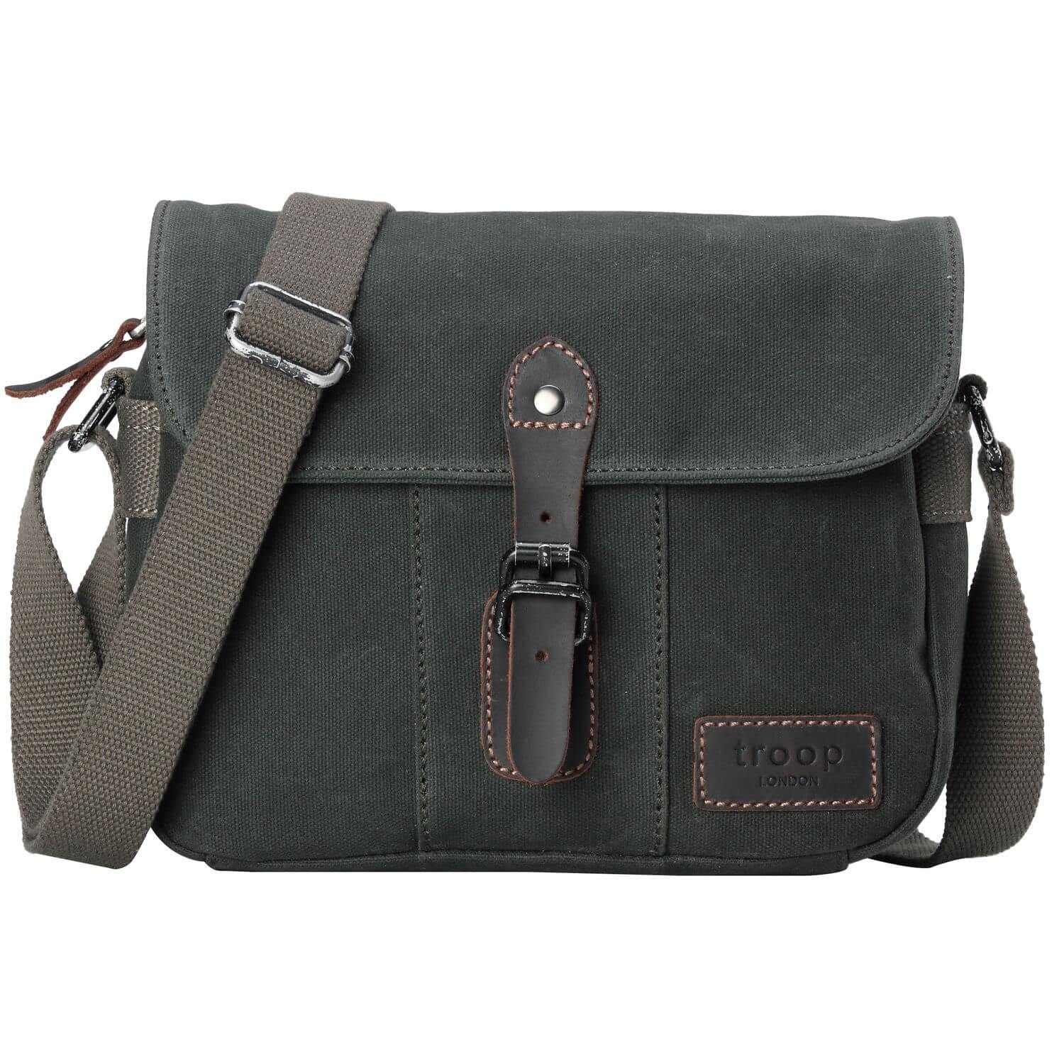 Waxed canvas crossbody bag with genuine leather trimmings, antique brass hardware, and adjustable shoulder strap