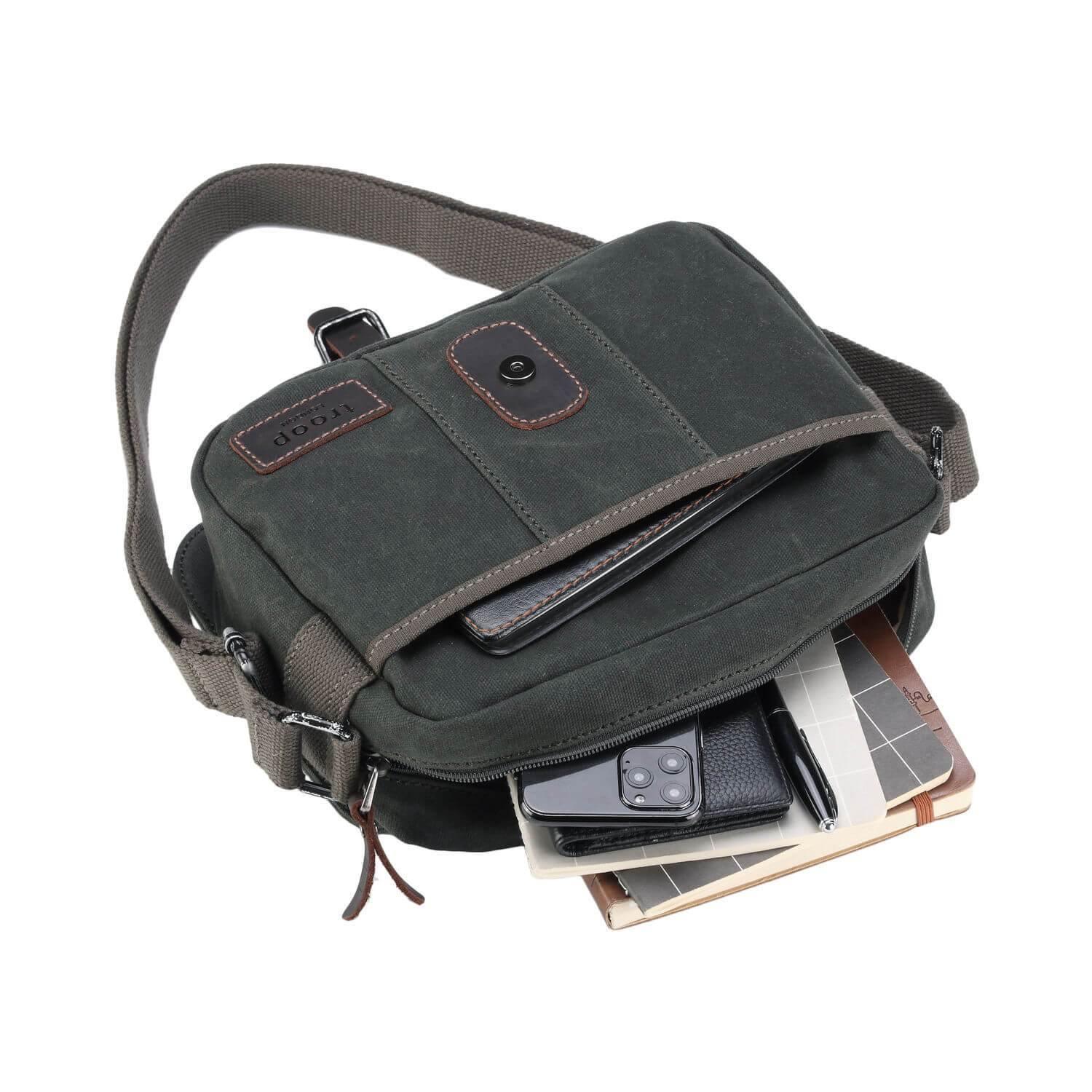 Waxed canvas crossbody bag with genuine leather trimmings, antique brass hardware, and adjustable shoulder strap — view 4