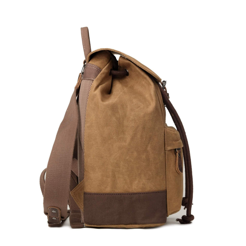 Heritage waxed canvas laptop backpack featuring genuine leather trimmings brass hardware and front zip pocket — view 4
