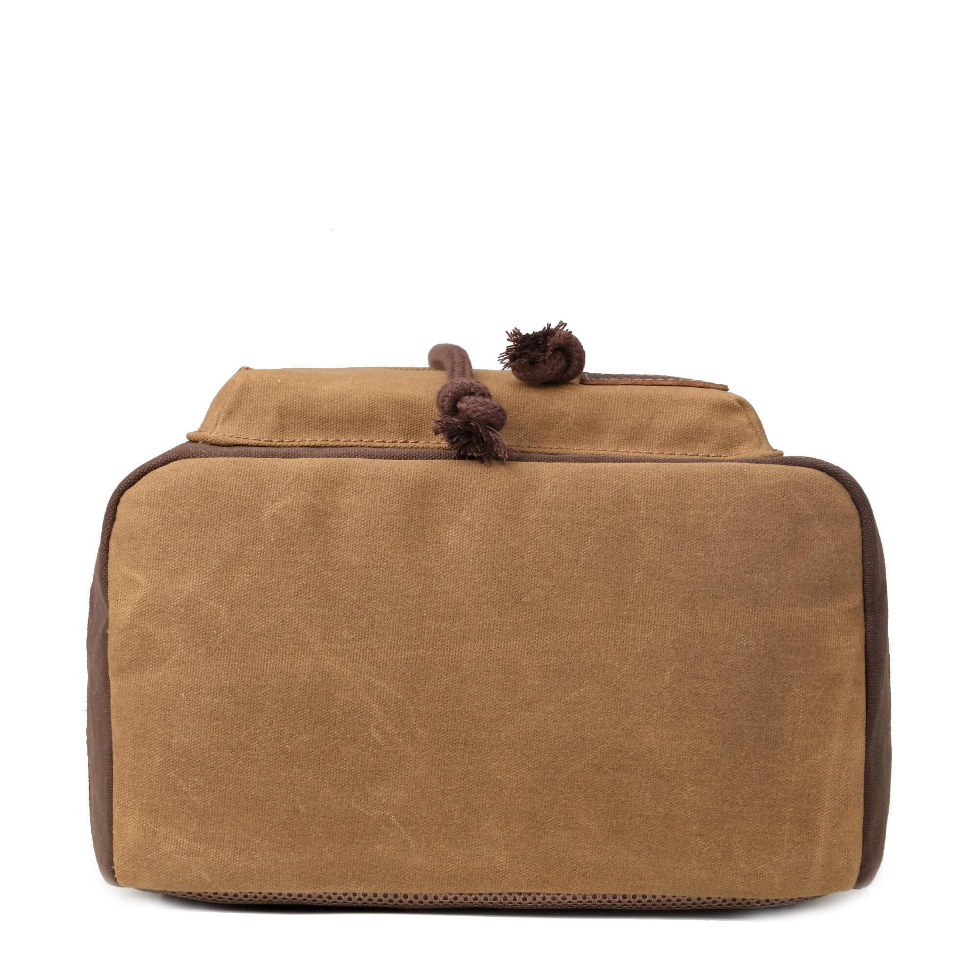 Heritage waxed canvas laptop backpack featuring genuine leather trimmings brass hardware and front zip pocket — view 5