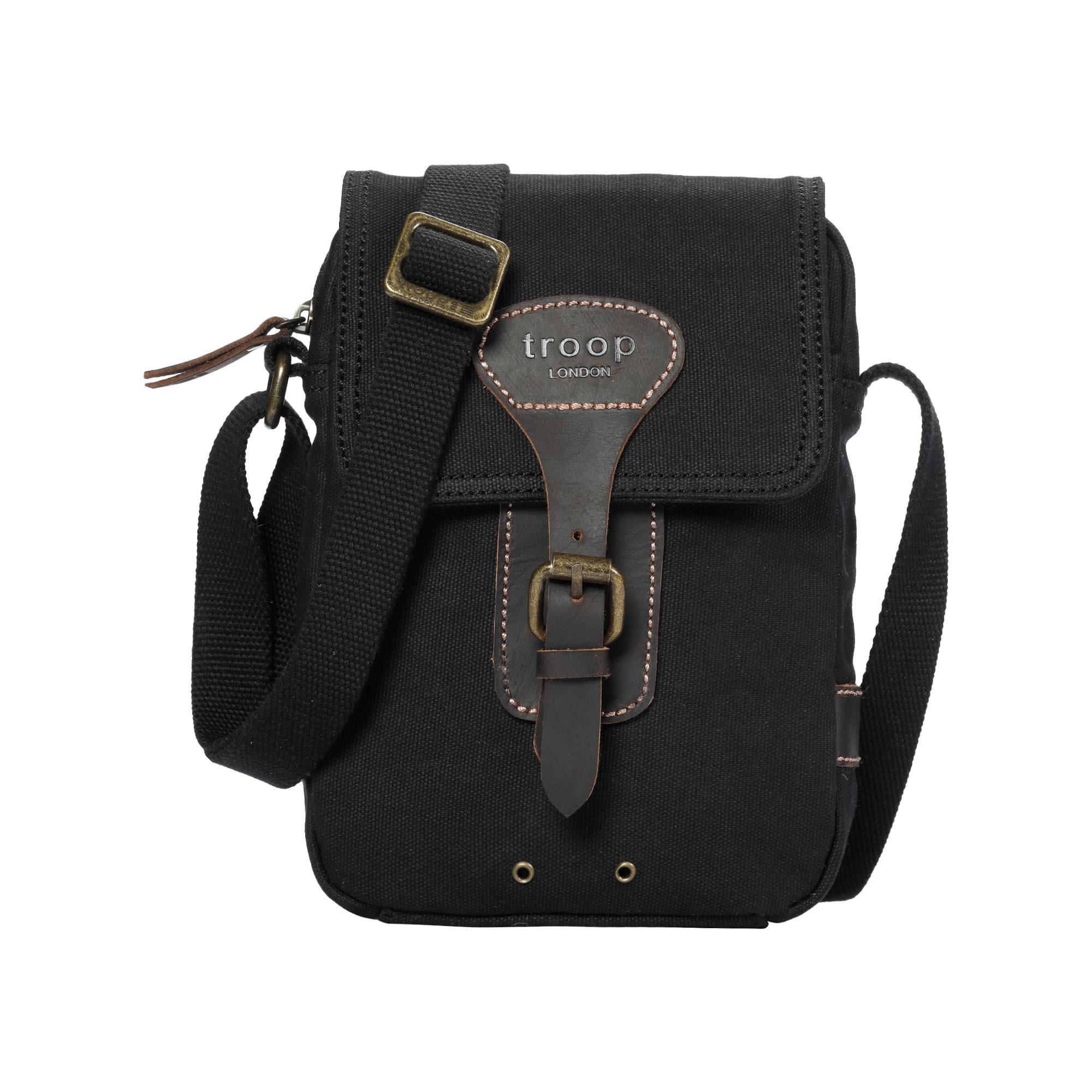 Compact waxed canvas crossbody bag with genuine leather trim and adjustable shoulder strap