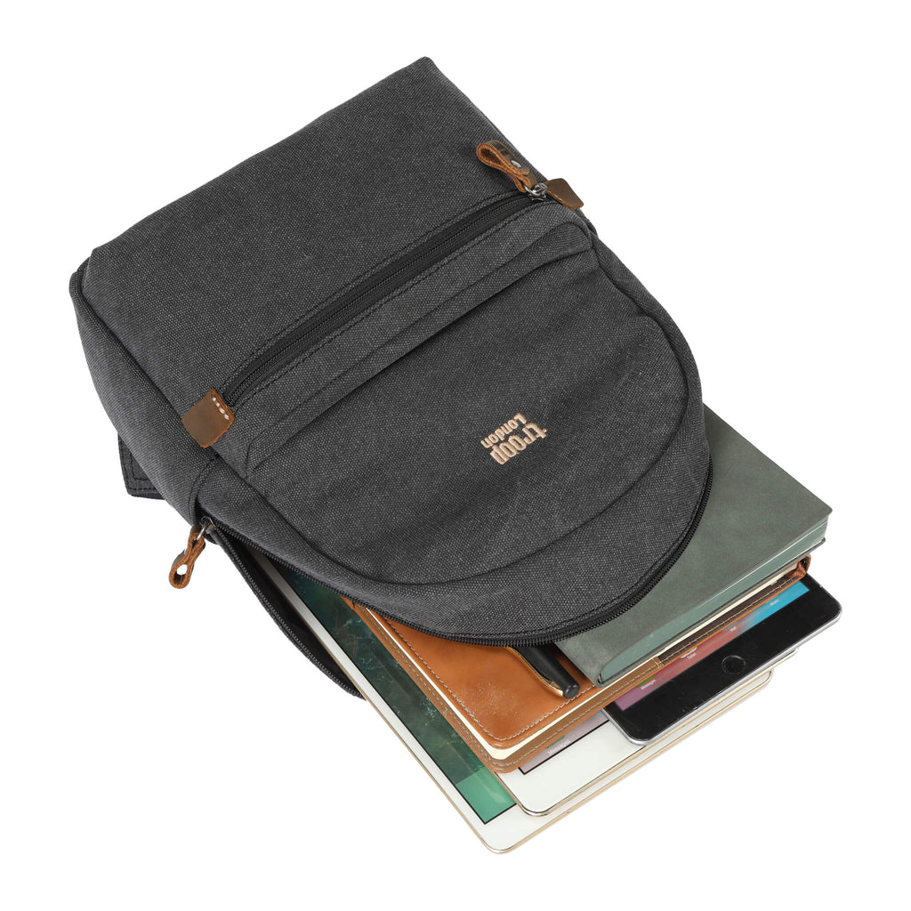 Small stonewashed canvas backpack with leather zip pulls and padded shoulder straps. — view 5