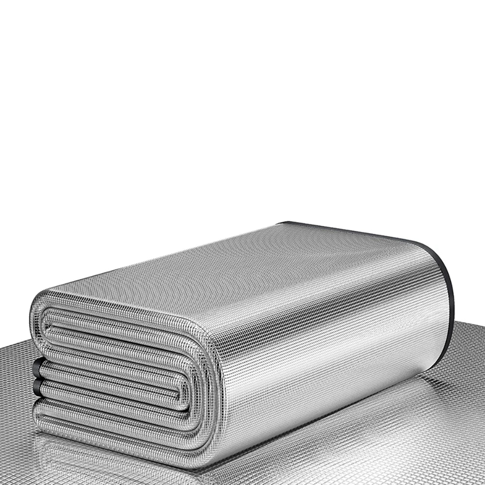 Waterproof silver aluminum outdoor picnic mat folded compactly next to its convenient portable storage bag — view 2