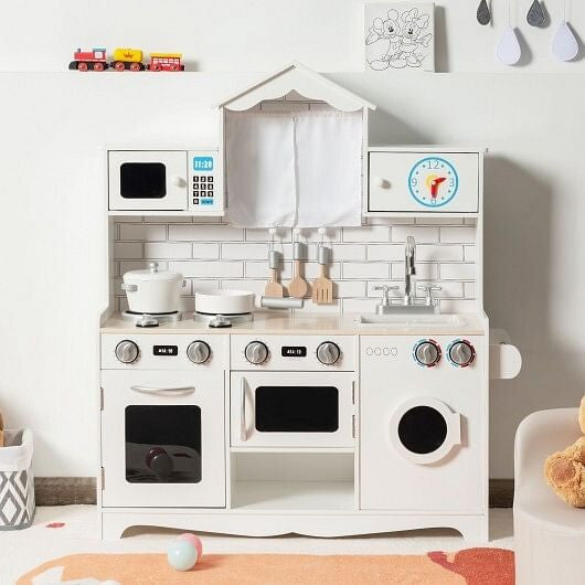 Wooden kids play kitchen set with washing machine, sink, oven, and cooking accessories. — view 3