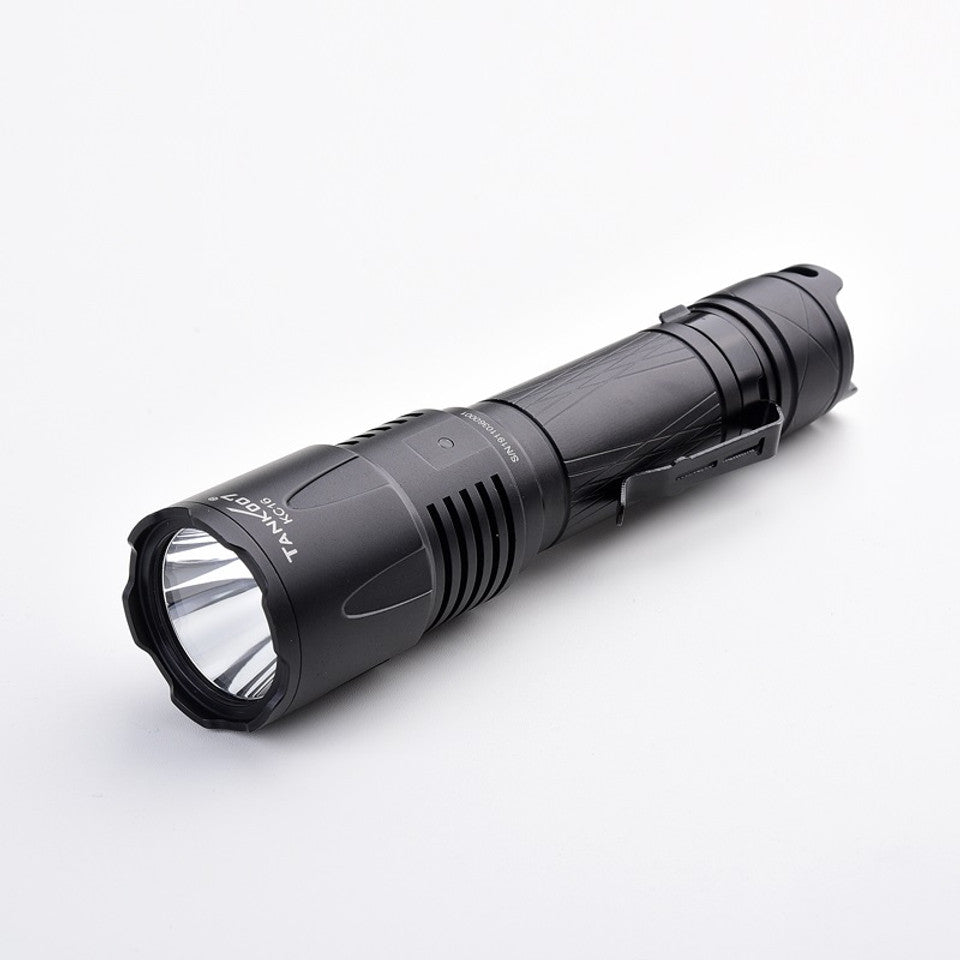 TANK007 KC16 black outdoor tactical flashlight with stainless steel pocket clip and wrist lanyard