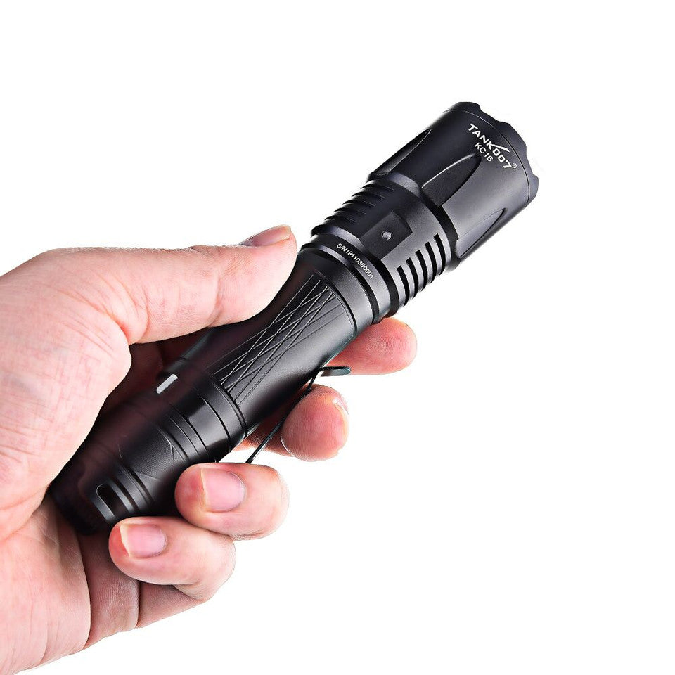 TANK007 KC16 black outdoor tactical flashlight with stainless steel pocket clip and wrist lanyard — view 2