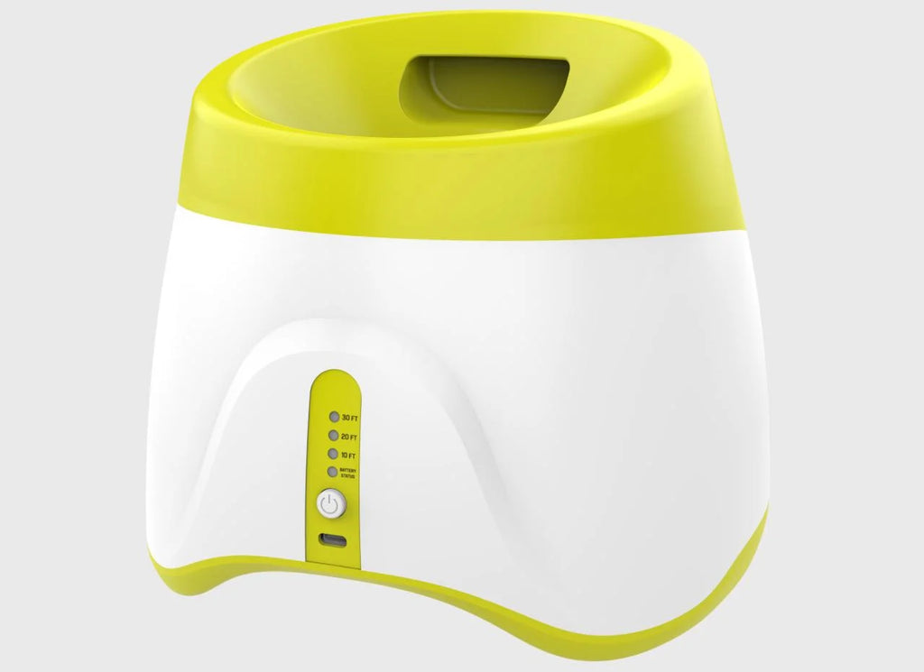 Automatic tennis ball launcher for dogs with a green tennis ball ready for interactive fetch — view 2