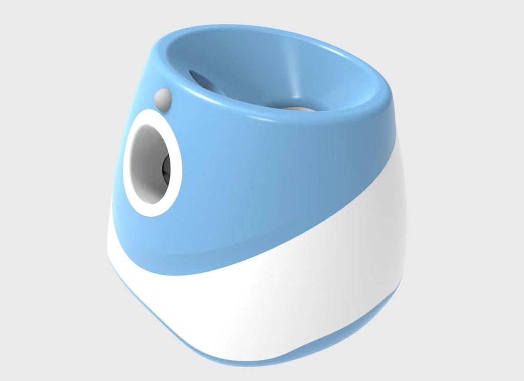 Automatic tennis ball launcher for dogs with a green tennis ball ready for interactive fetch — view 3