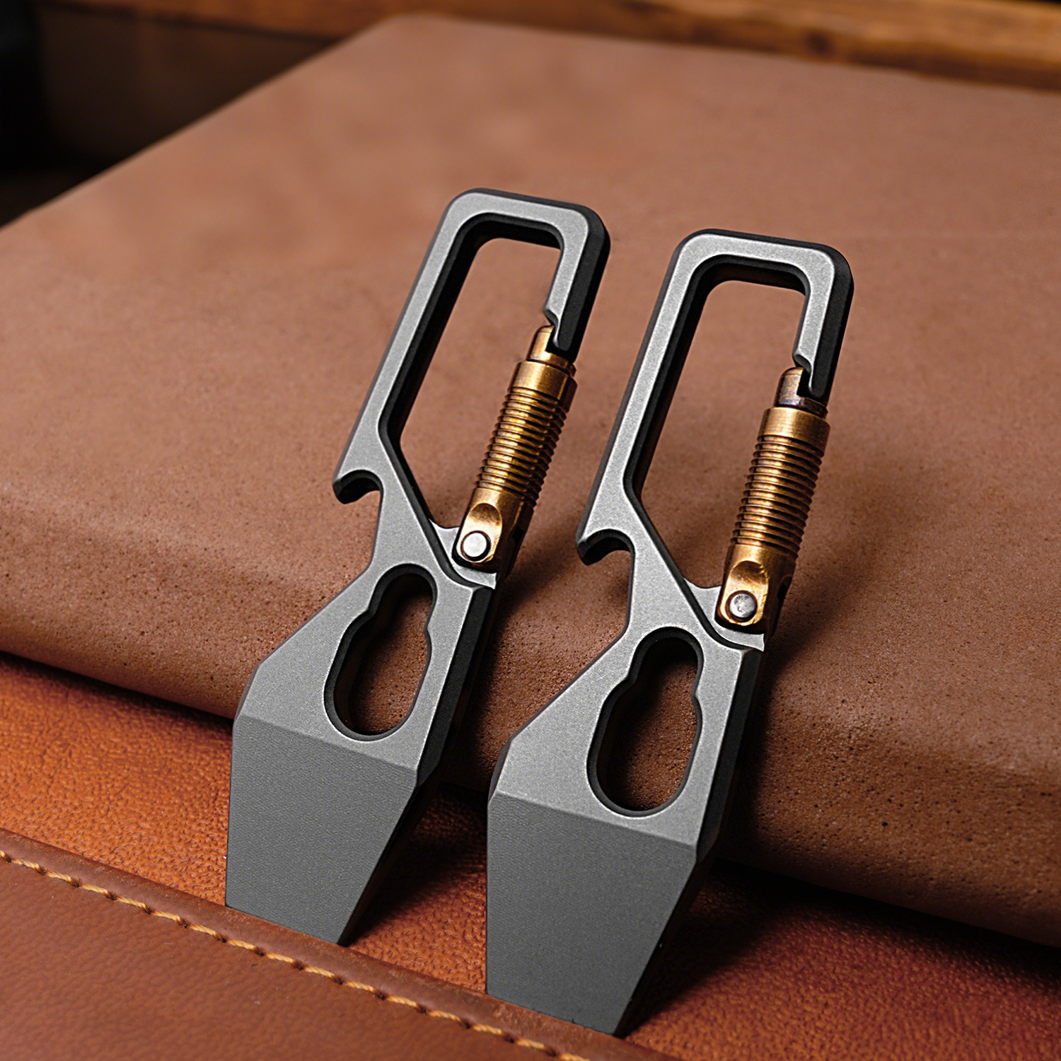 Titanium multi-tool carabiner in metallic silver, designed for outdoor camping and heavy-duty everyday carry — view 3
