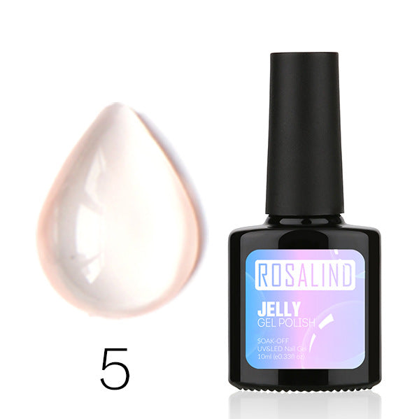 Translucent nail polish bottle and applicator brush featuring a sheer natural resin formula — view 5