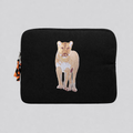 Lion laptop sleeve in handmade cotton canvas with intricate wildlife embroidery and protective padding.