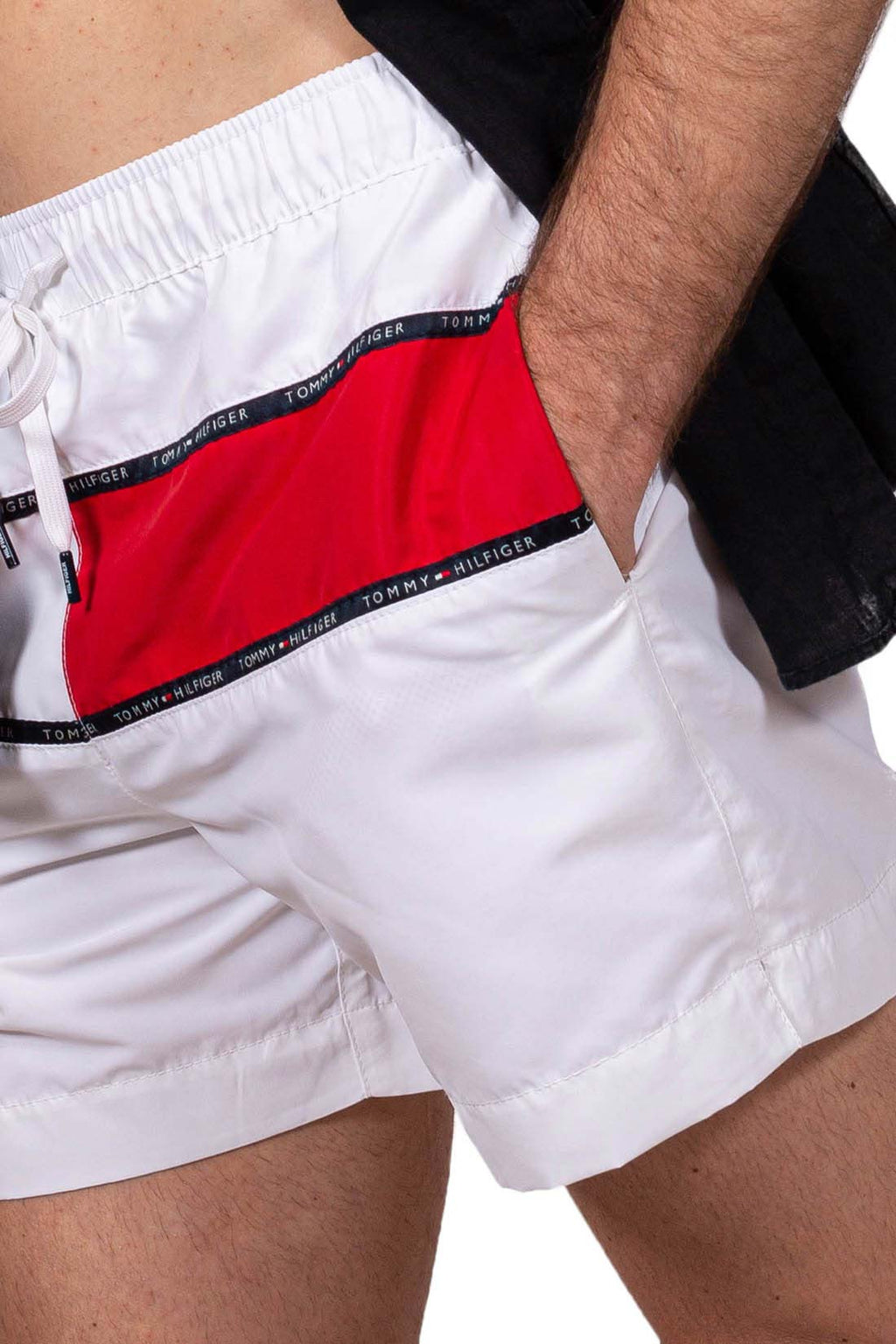 Men's white colorblock swim shorts with elastic waistband, drawstring, and signature logo taping on the front. — view 5