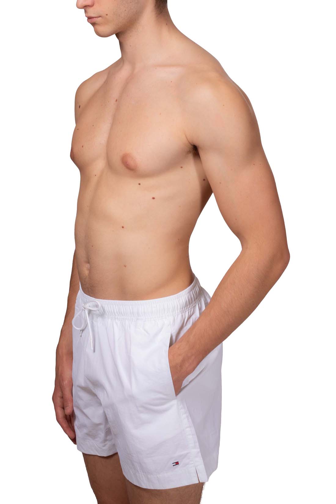 Men's white nylon swim shorts with drawstring waist and embroidered logo detail — view 5