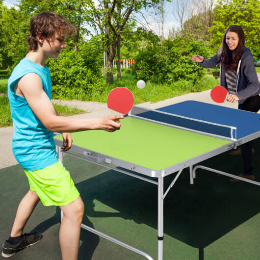 Mini folding ping pong table in blue and green with attached net, paddles, and balls.