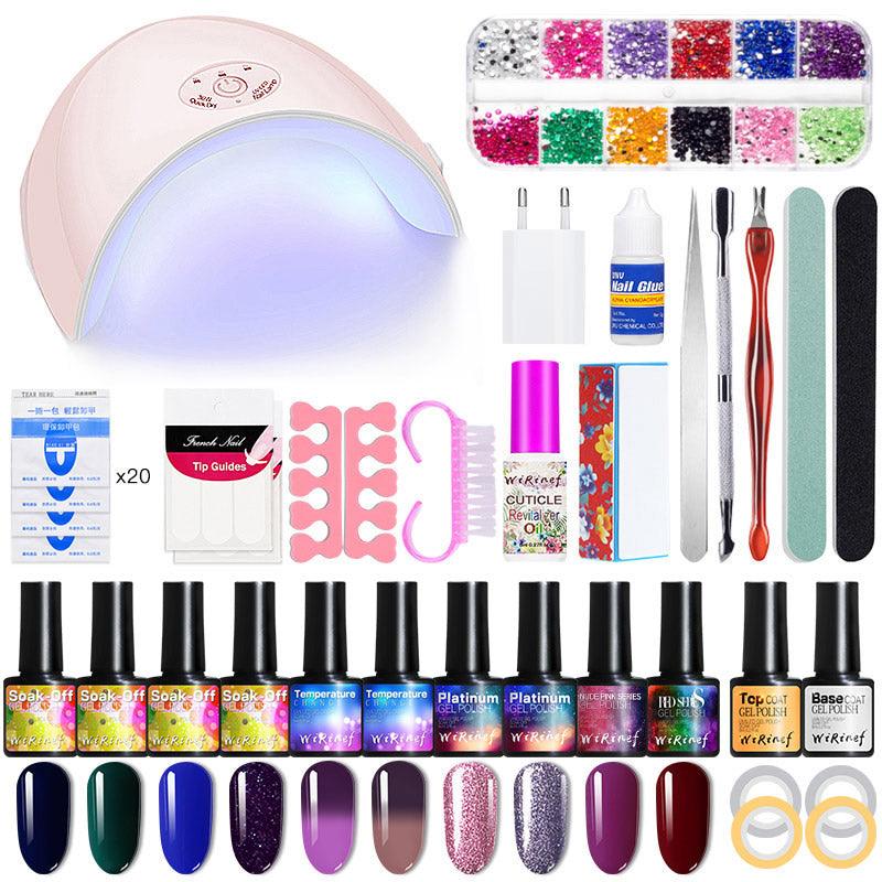Complete UV gel nail art kit with a 36W dryer lamp, colorful polishes, and manicure tools — view 2