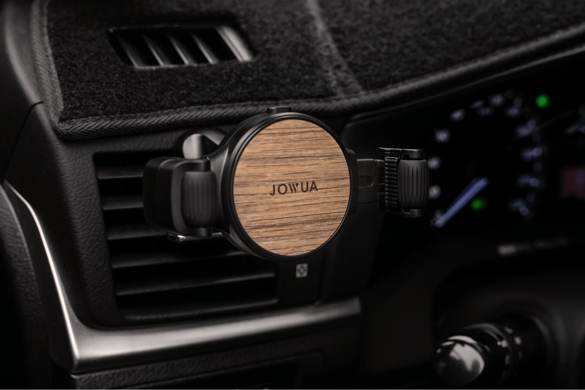 Universal air vent car mount for smartphones featuring black adjustable clamps and silicone roller grip — view 4