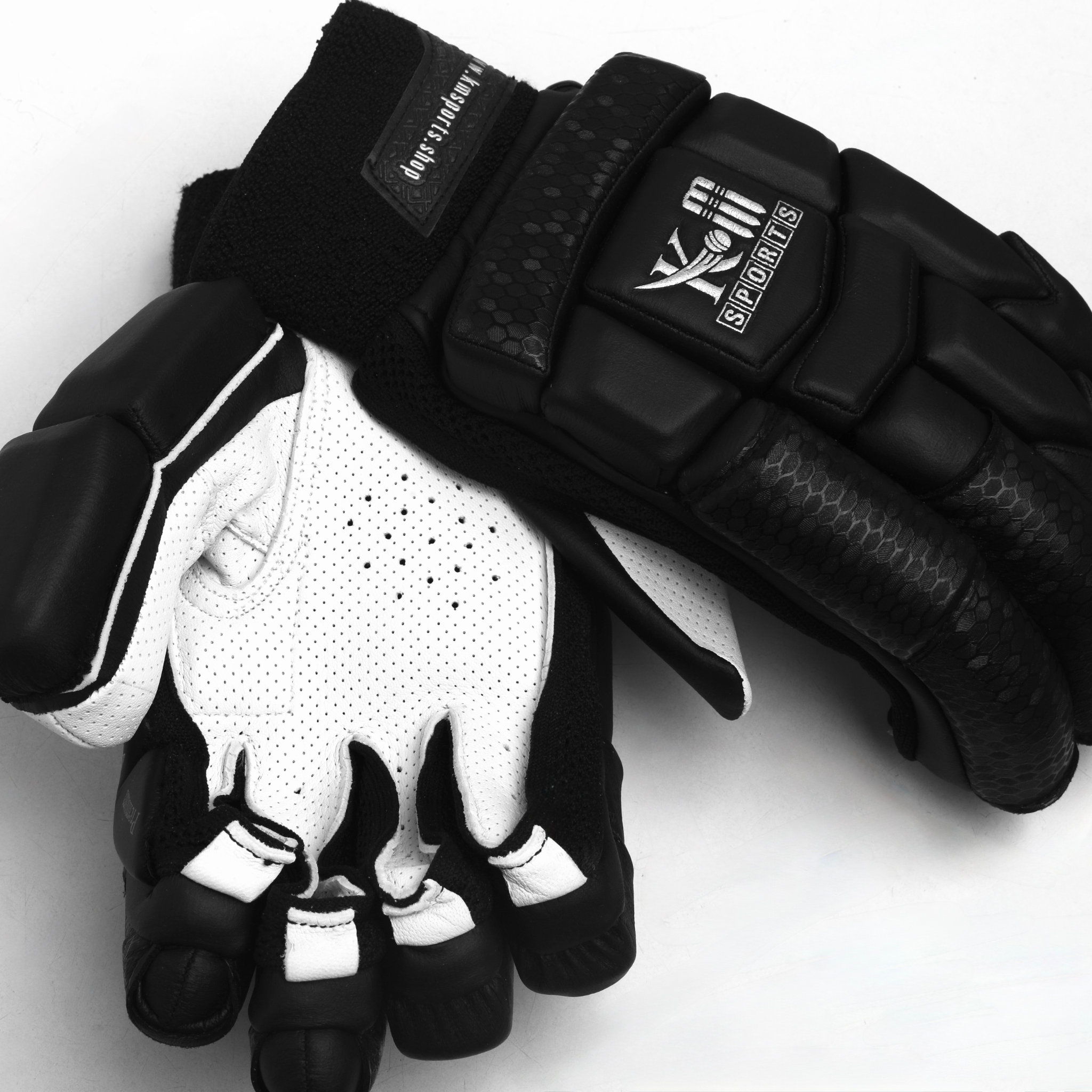White leather cricket batting gloves with breathable mesh and padded fingers for impact protection — view 3