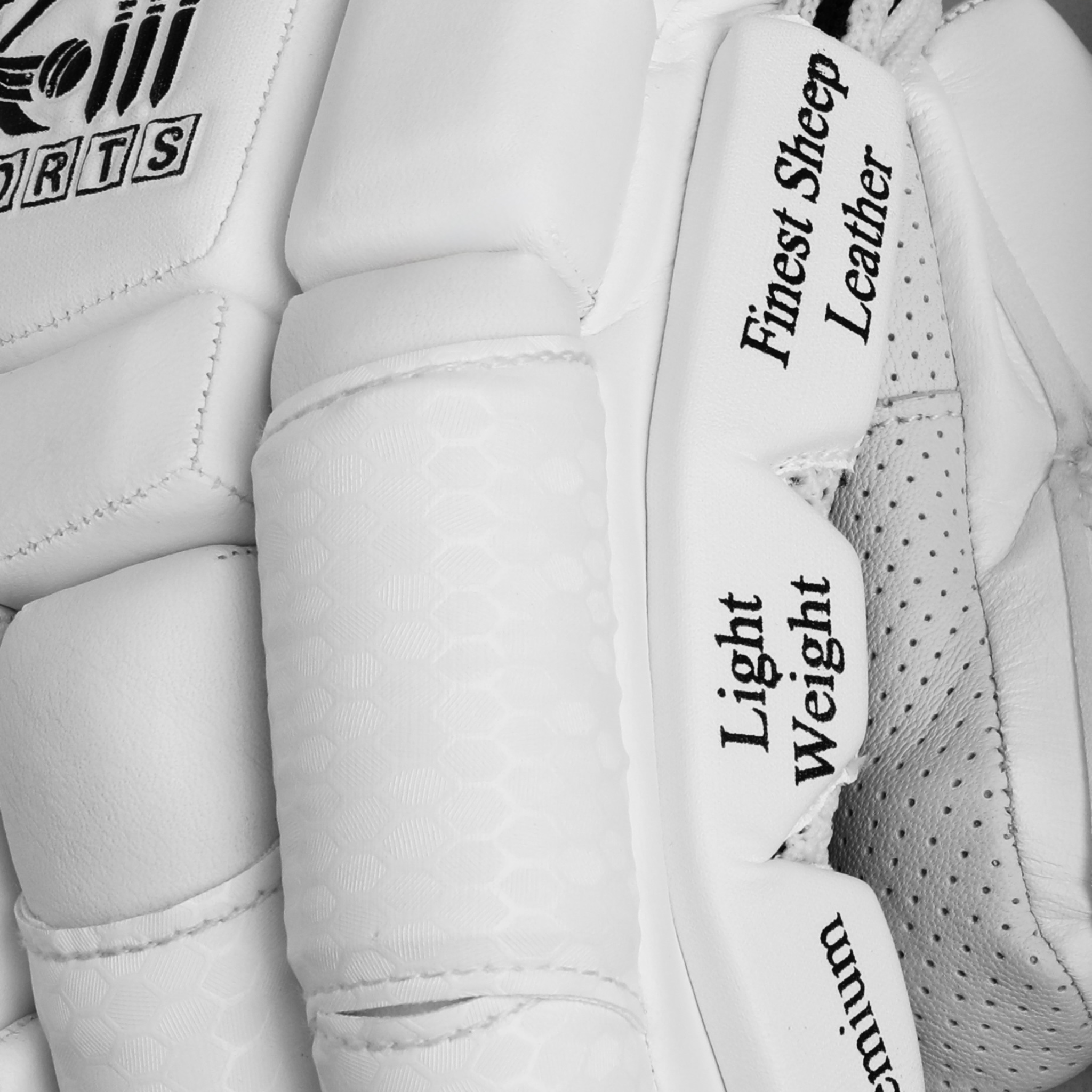 White leather cricket batting gloves with breathable mesh and padded fingers for impact protection — view 5