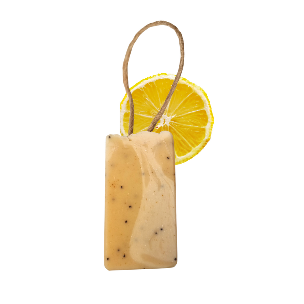 Lemon sorbet handmade natural soap bar with poppy seeds, showcasing a textured yellow botanical finish. — view 5