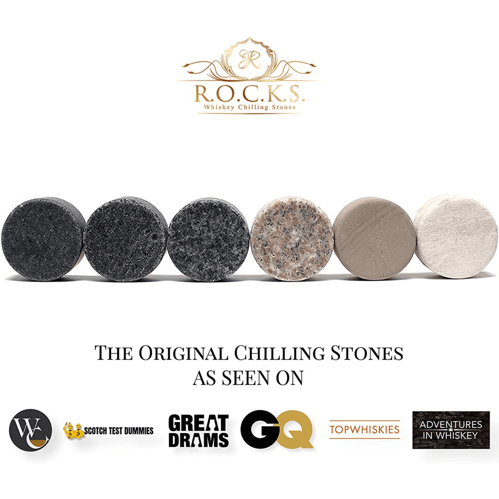 Bourbon barrel aged coffee bag next to six handcrafted granite whiskey chilling stones — view 4