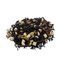 Spiced apple chai loose leaf black tea blend with visible dried fruit and warming winter spices