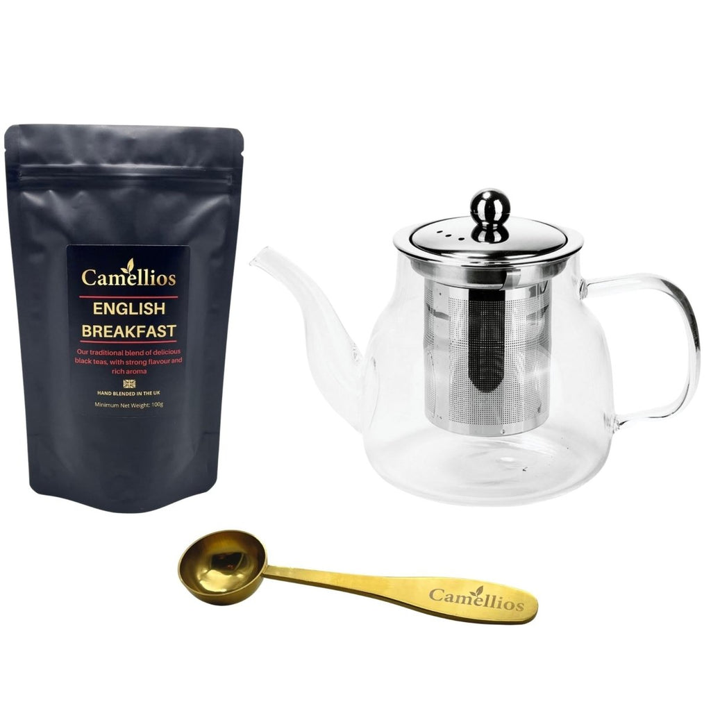 Loose leaf tea set featuring a borosilicate glass teapot, stainless steel spoon, and artisan tea blend
