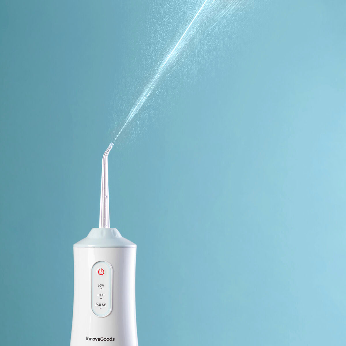 Portable blue and white cordless water flosser with interchangeable cleaning heads and USB cable. — view 14
