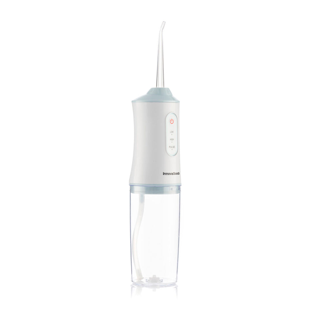 Portable blue and white cordless water flosser with interchangeable cleaning heads and USB cable. — view 4