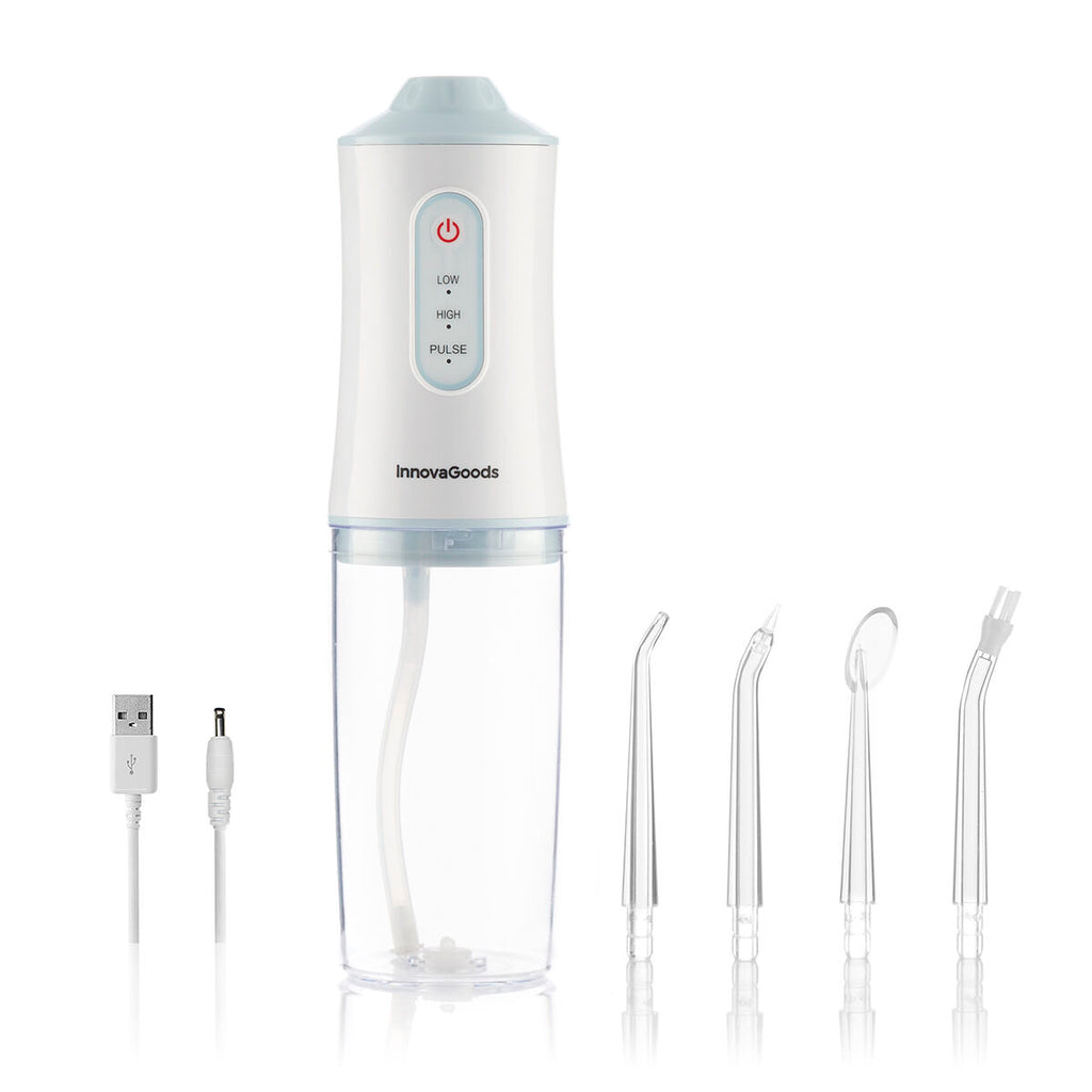 Portable blue and white cordless water flosser with interchangeable cleaning heads and USB cable. — view 3