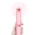 Pink pocket sized handheld mini fan with built-in power bank and transformable folding design