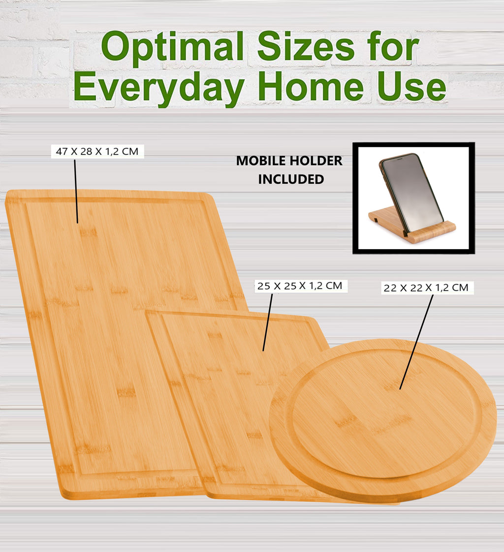Three piece natural bamboo cutting board set with juice groove and matching mobile phone holder — view 2