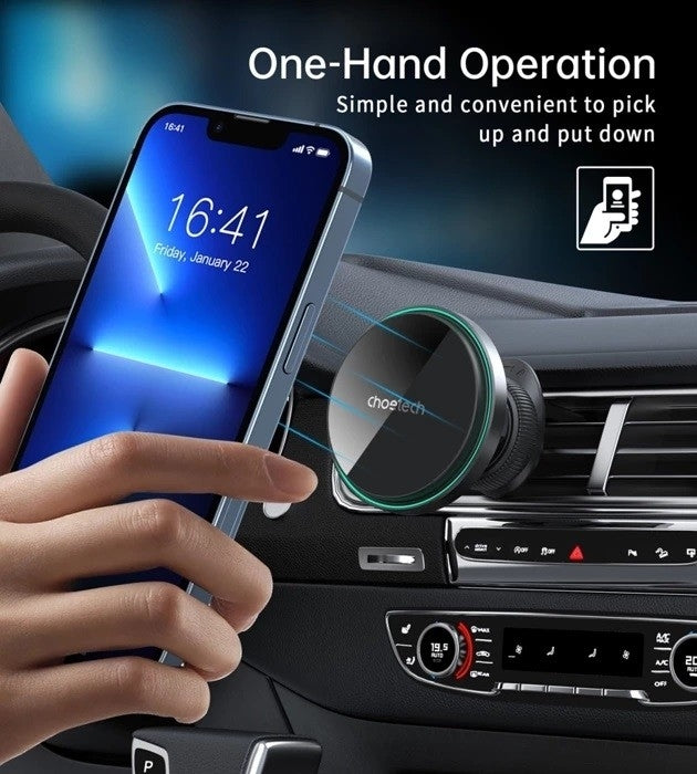 Black 15W magnetic wireless car charger with LED light attached to a car air vent — view 3