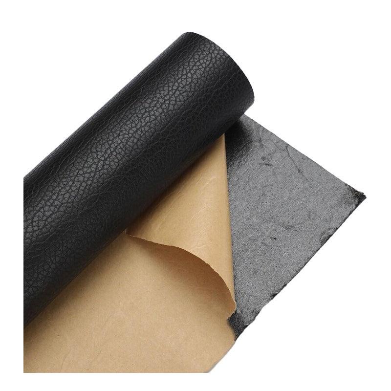 Two dark grey self-adhesive faux leather repair patches for sofas and auto interiors. — view 2