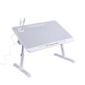 Adjustable laptop desk stand tray featuring anti-slip leather surface, sturdy folded legs, and storage drawer