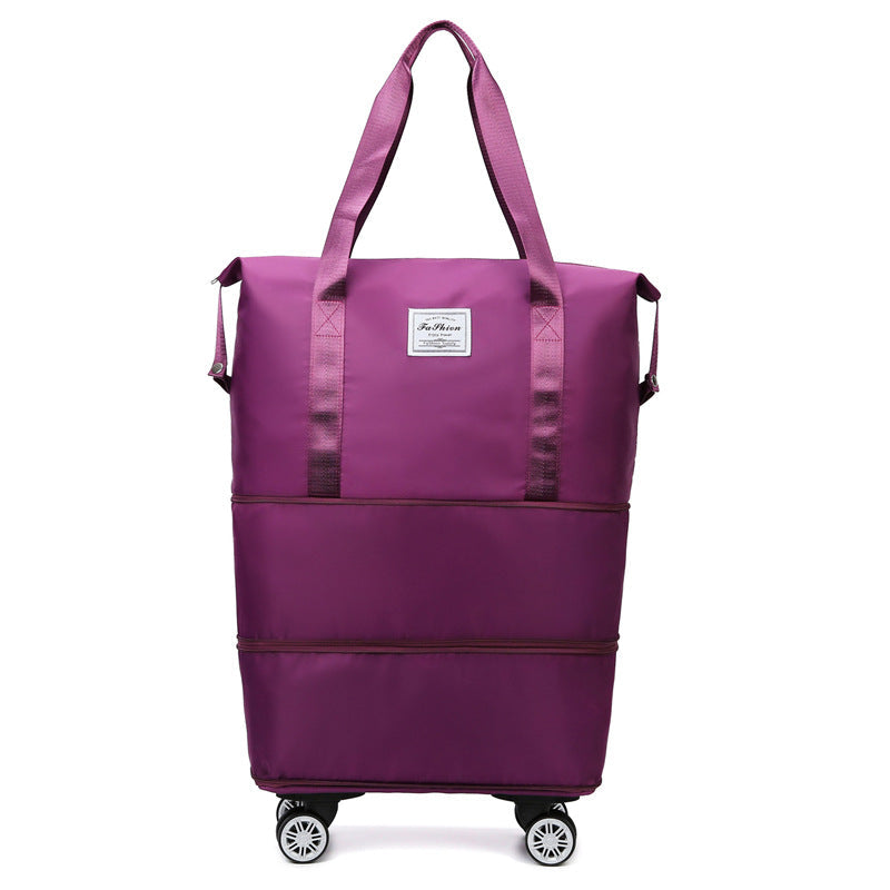 Purple large capacity foldable rolling travel duffel bag with wheels and durable waterproof fabric.