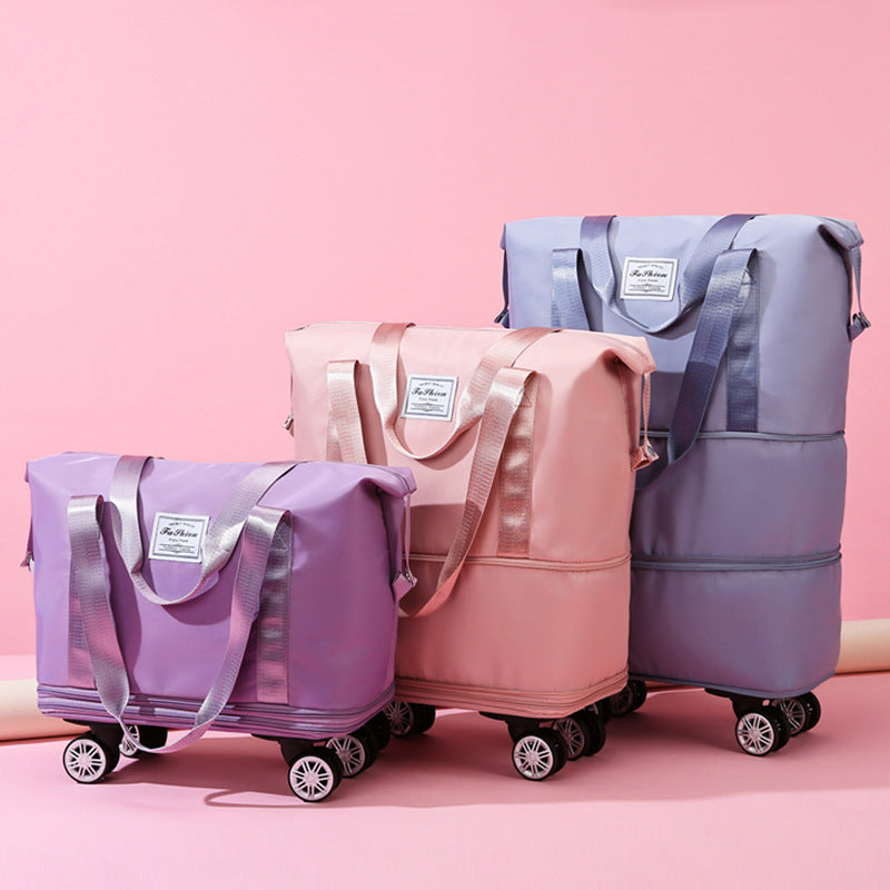 Purple large capacity foldable rolling travel duffel bag with wheels and durable waterproof fabric. — view 2