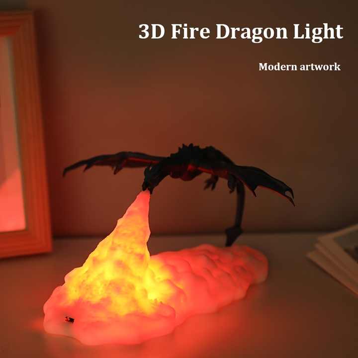 3D printed LED dragon night light breathing glowing fire on a dark bedroom desk