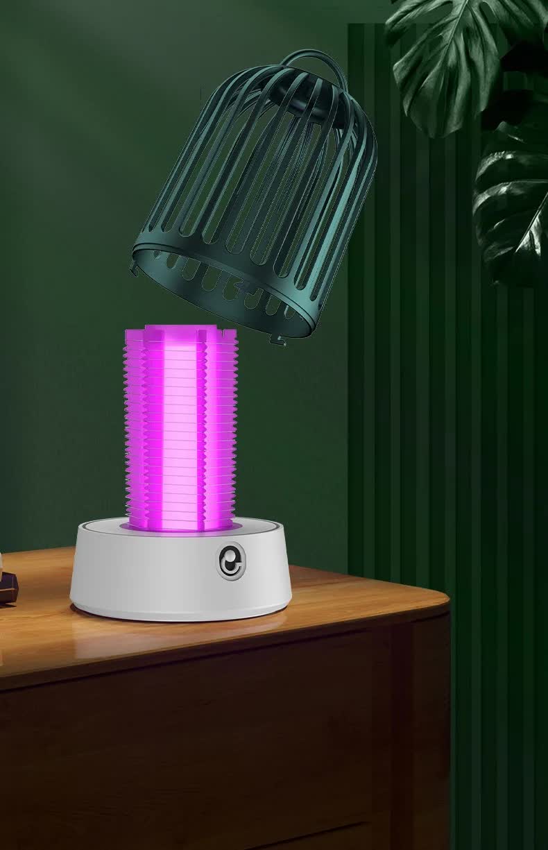 Yellow electric mosquito killer lamp, compact portable bug zapper with internal UV light grid. — view 3