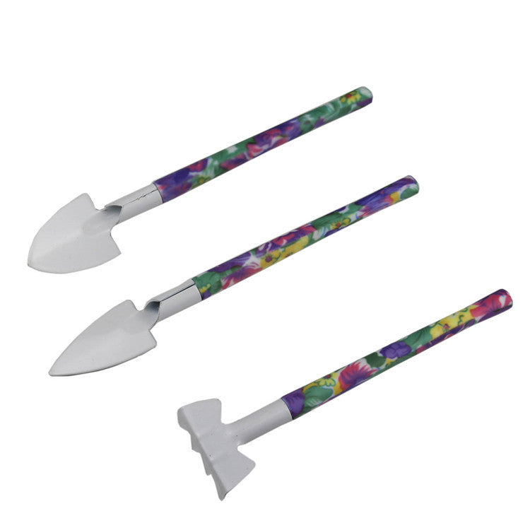 Green 5-piece compact gardening tool set in a durable carrying case with stainless steel trowels — view 2