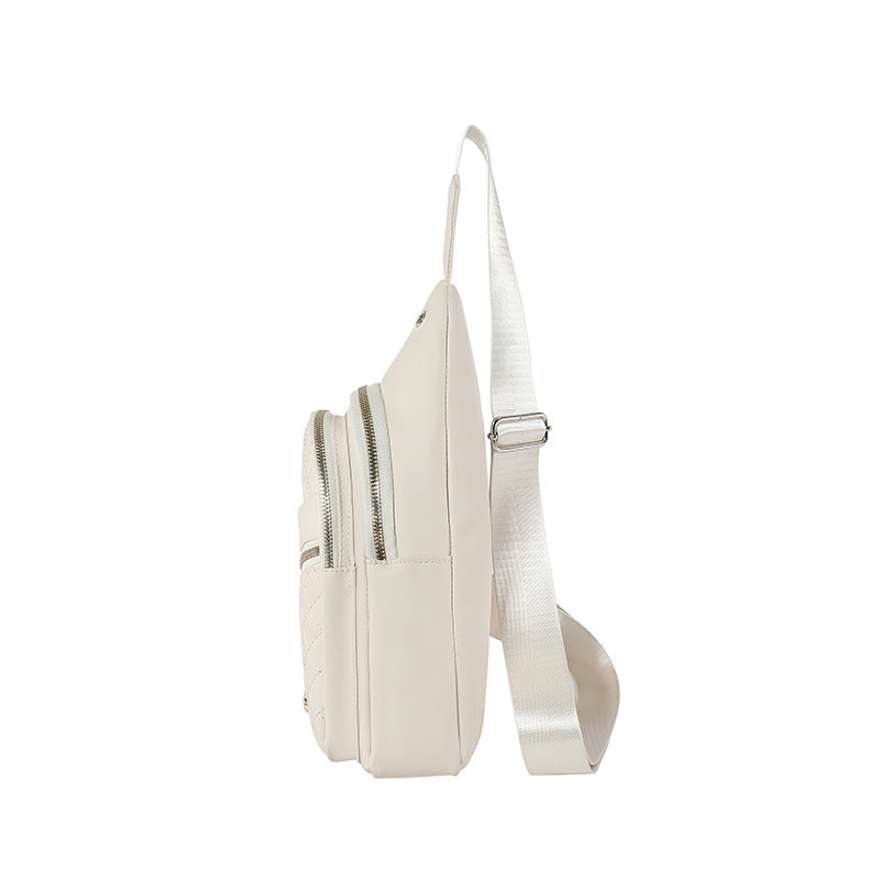 White quilted sling bag crossbody backpack in premium PU leather with adjustable strap — view 4