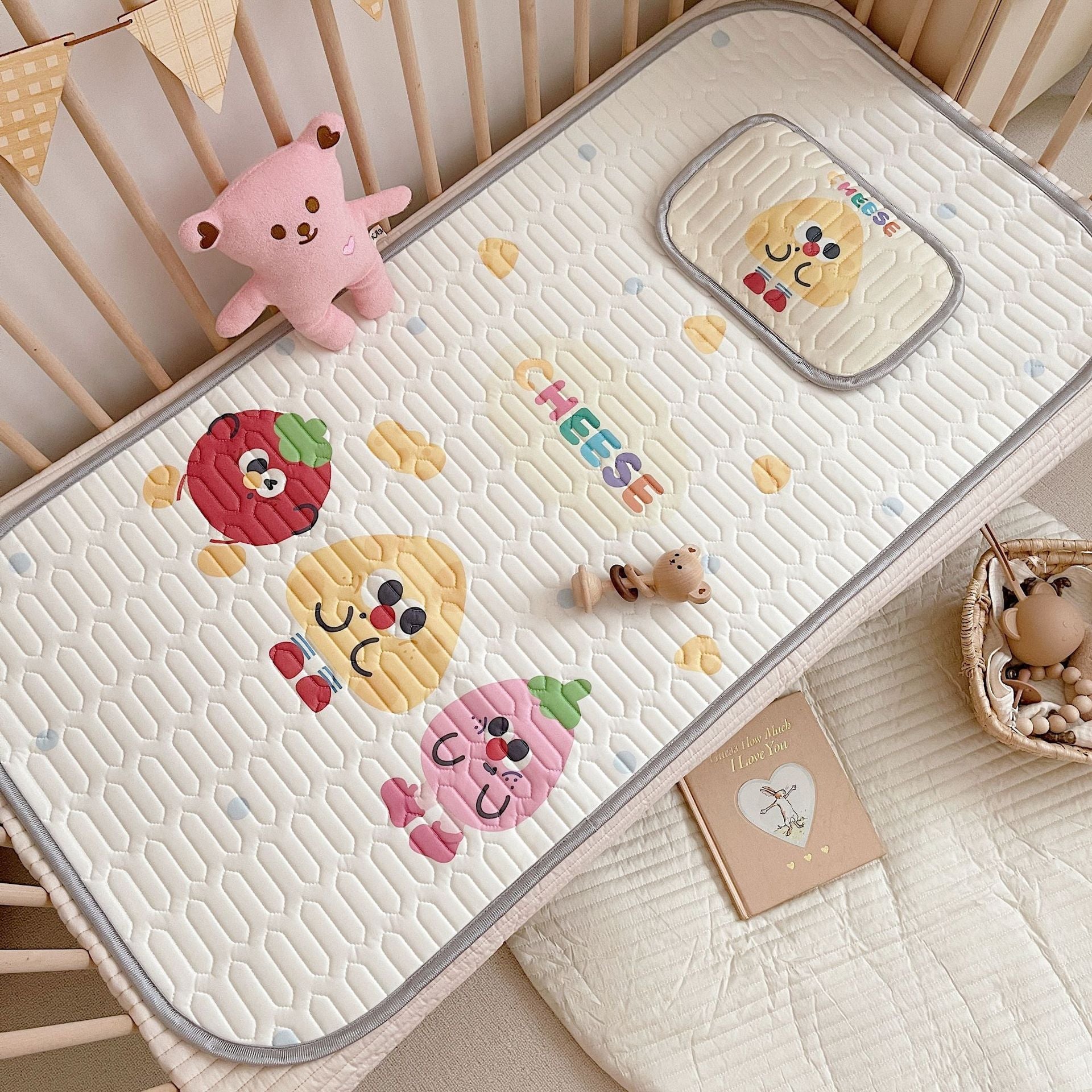 Kids cooling mat set with yellow cheese pattern latex mattress protector and matching buckwheat toddler pillow