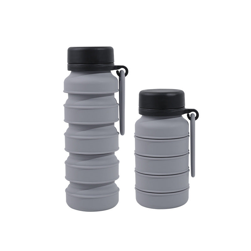 Grey and black collapsible silicone water bottle with carry loop and leak-proof lid, 510ml capacity