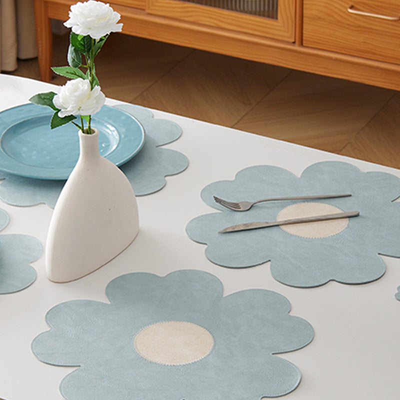 Set of six reversible flower shaped PU leather placemats for dining table protection and decor — view 4