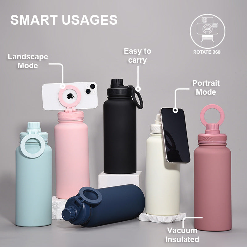 Brown one litre stainless steel water bottle with magnetic phone holder lid and carry loop — view 2