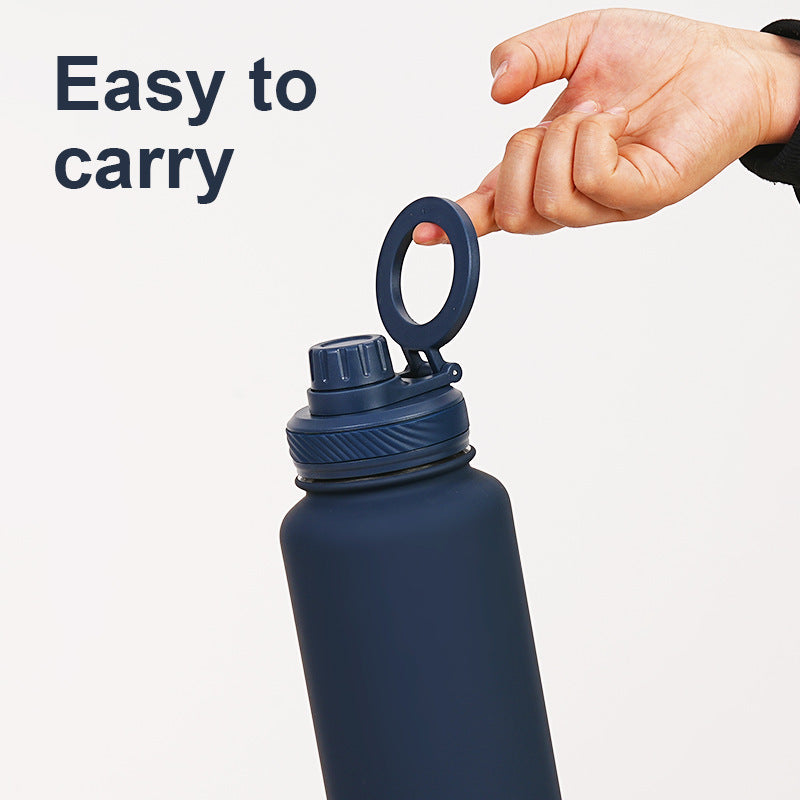 Brown one litre stainless steel water bottle with magnetic phone holder lid and carry loop — view 5