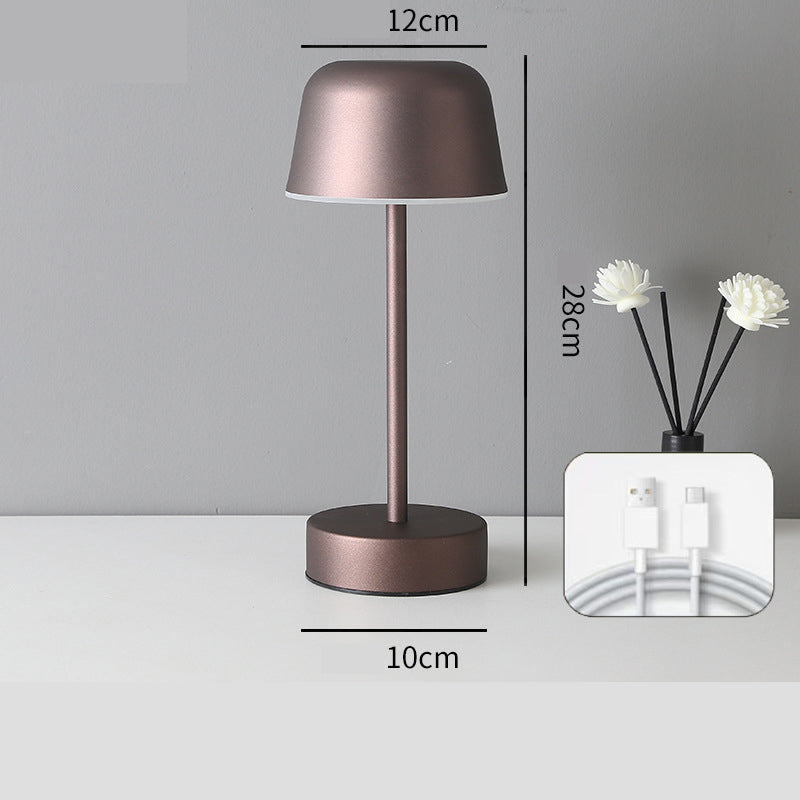 Modern coffee brown minimalist LED table lamp with a sleek metal cordless touch control design