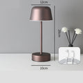 Modern coffee brown minimalist LED table lamp with a sleek metal cordless touch control design